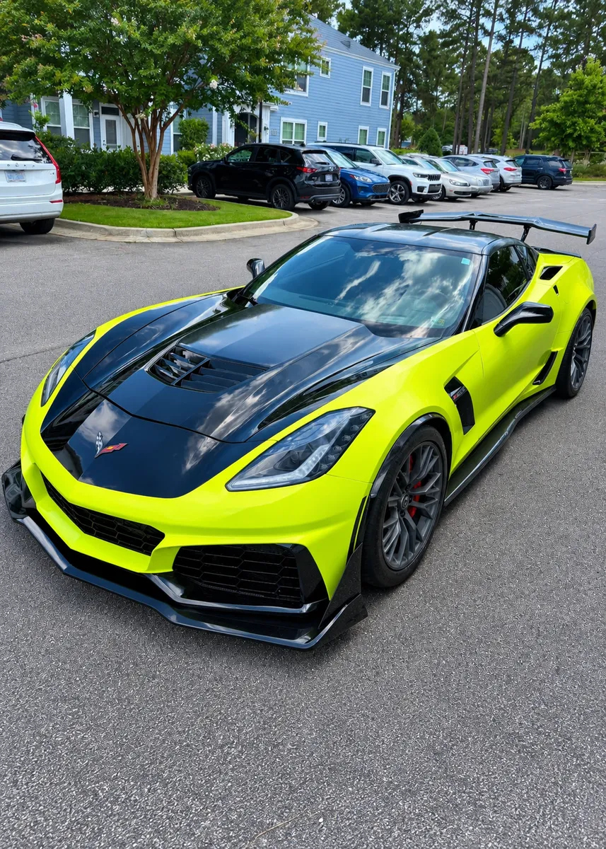 Yellow and black Chevrolet Corvette with a deep, glossy finish